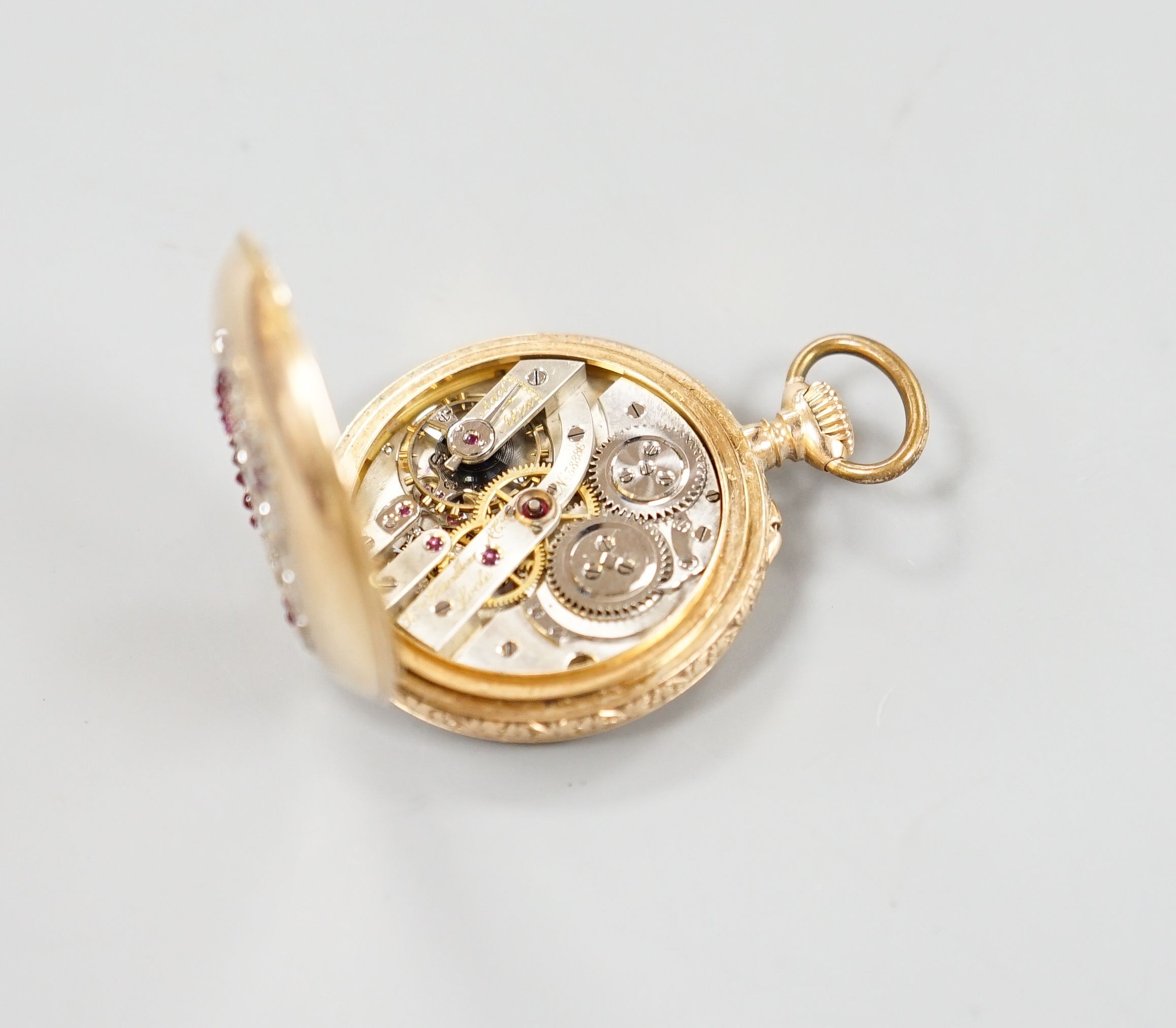 A Swiss 18k, ruby and diamond set keyless fob watch by Henry Grandjean & Cie (a.f.)